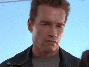 Awkward-Arnold-Schwarzenegger-Smile-In-Terminator-2-Gif